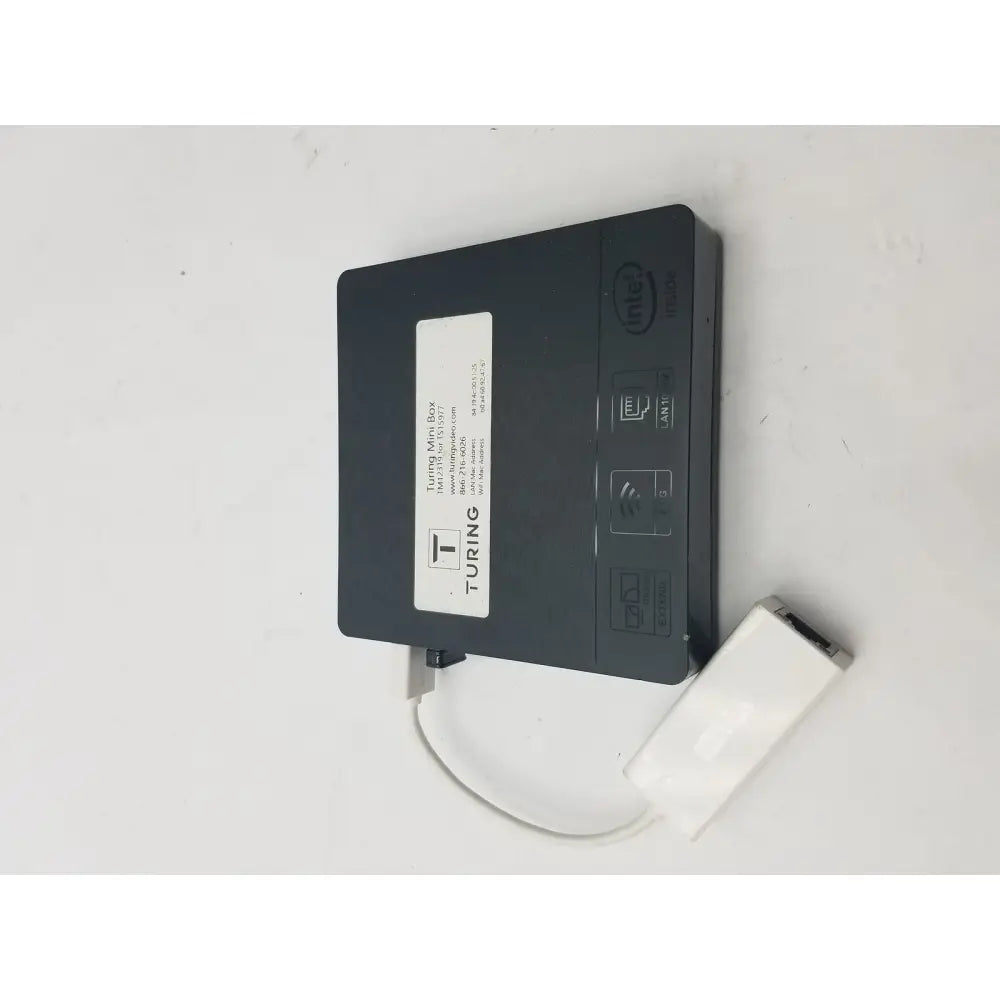 Black turing mini box with intel badge and white 3 pin female connector cable attached for secure connections