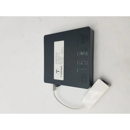 Black turing mini box with intel badge and white 3 pin female connector cable attached for secure connections