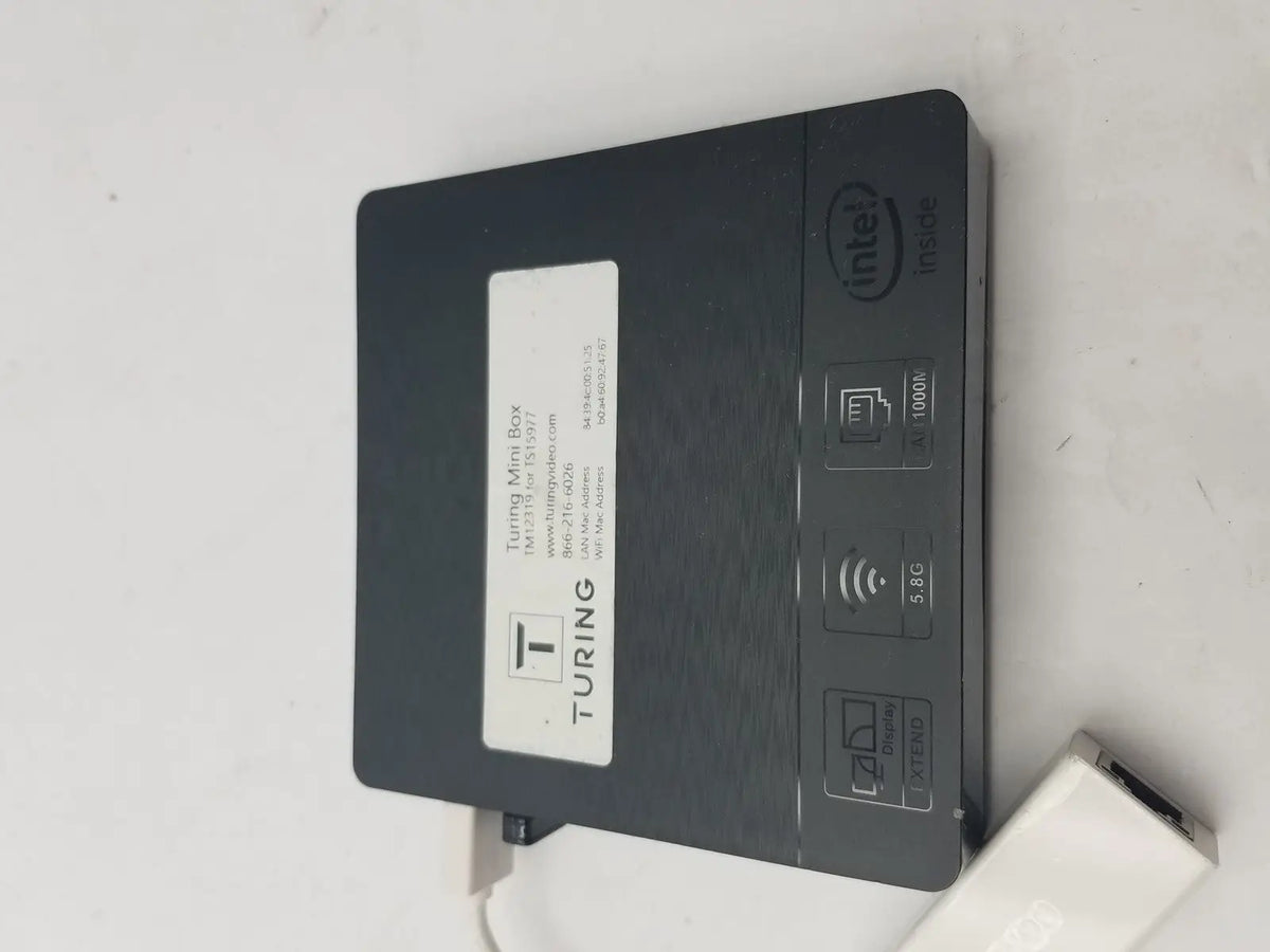 Black turing mini box with intel n3060e processor 5g connectivity and matte finish shown with 3 pin female connector cable