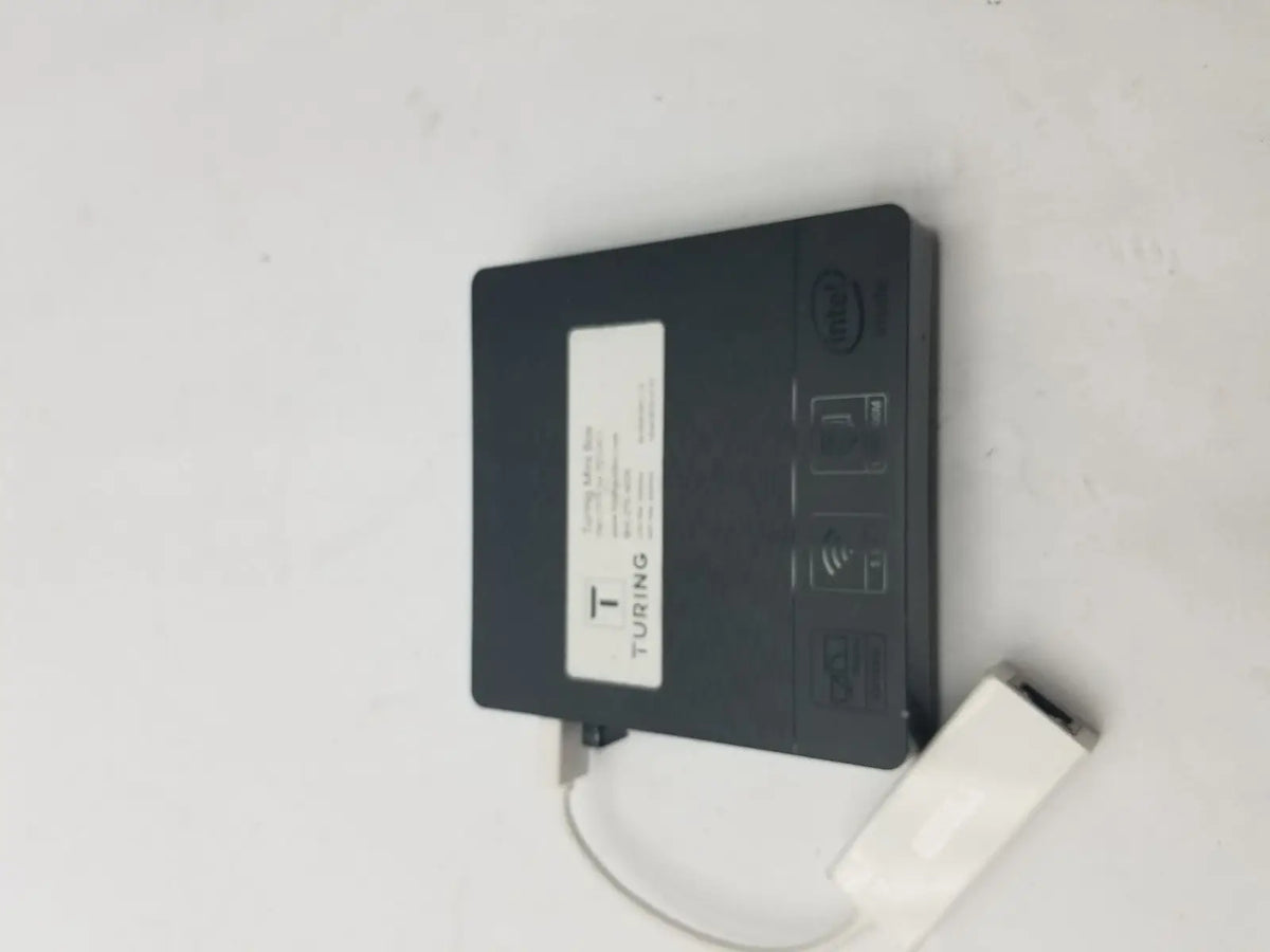 Black turing branded wireless network adapter with white usb cable attached to a 3 pin female connector cable