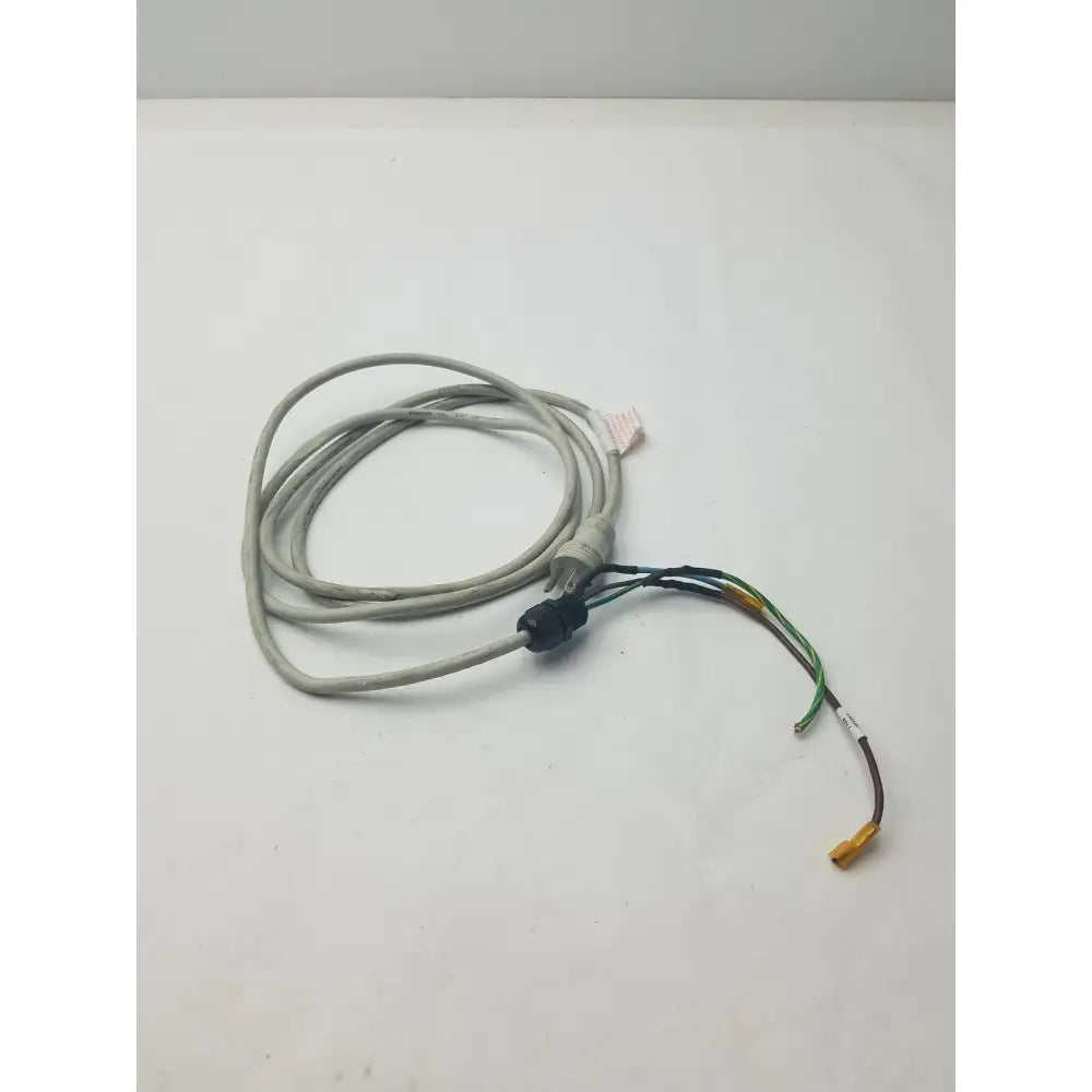 Gray coiled 3 prong power cable with black connector and exposed multi-colored wires in a wire connector harness