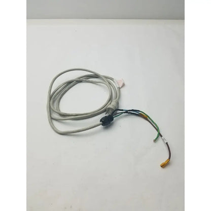 Gray coiled 3 prong power cable with black connector and exposed multi-colored wires in a wire connector harness