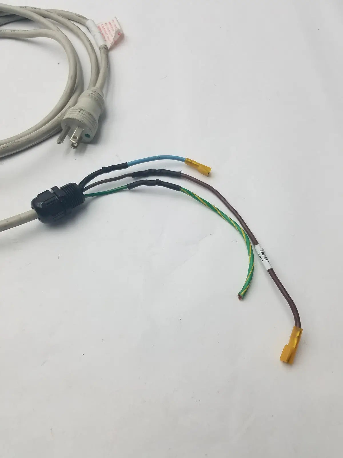 Gray 3 prong power cable with black connector and blue green brown wires featuring yellow wire connector harness