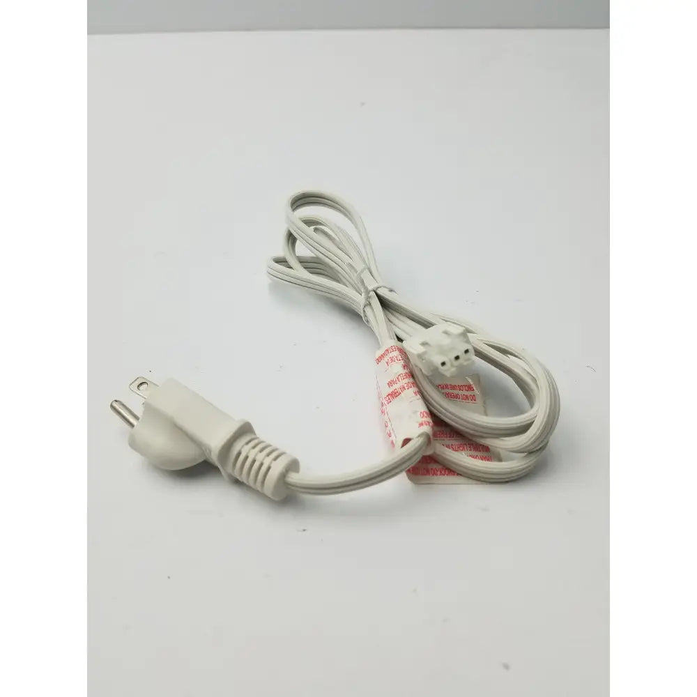 White 3 prong to 3 pin female power extension cord with two prong plug coiled neatly on a plain surface