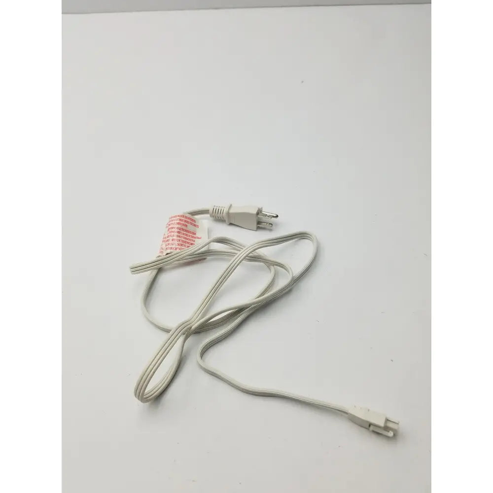 White power extension cord with two molded plastic plugs featuring a three-prong and smaller connector design