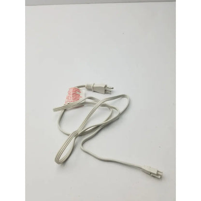 White power extension cord with two molded plastic plugs featuring a three-prong and smaller connector design