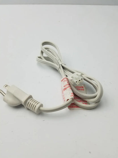 White electric power extension cord with a three-prong plug and three-pin female connector wrapped in red tape