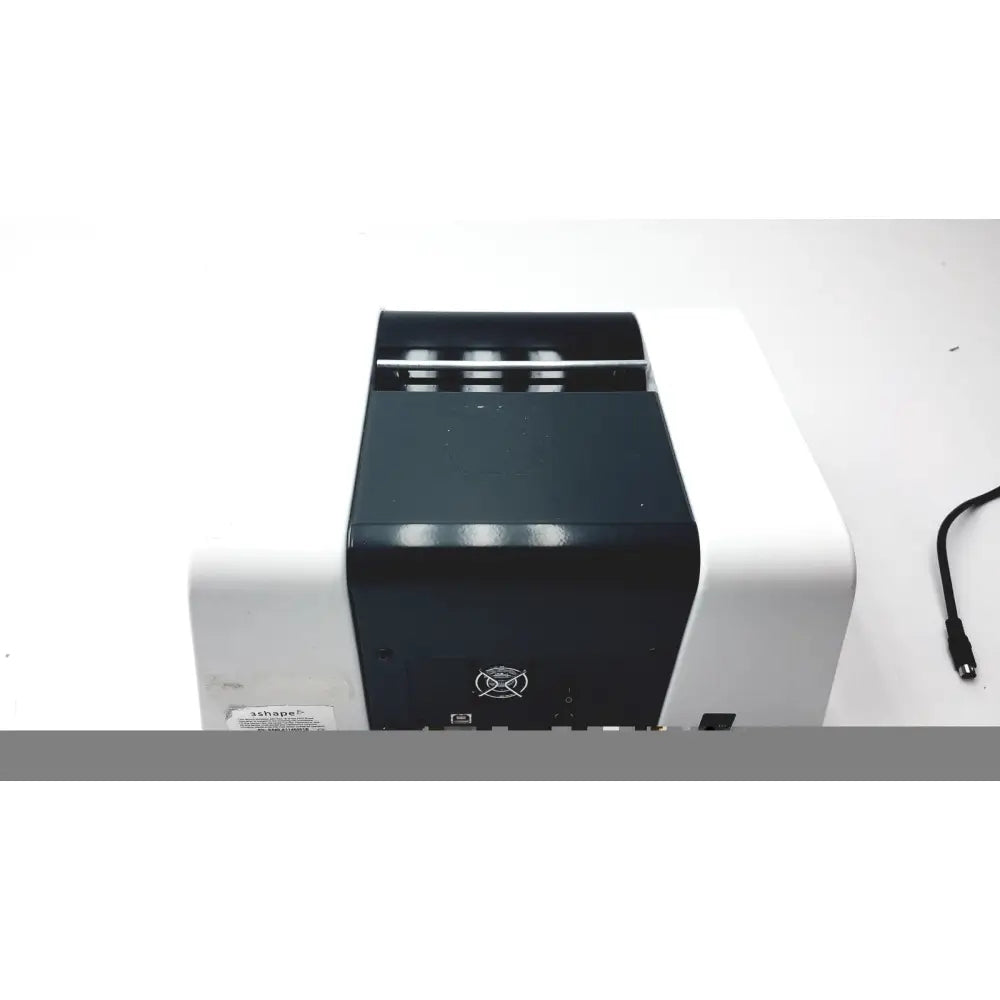Black and white thermal printer with sleek modern design included in 3 shape calibration kit a1146001b with legato 2 scanner