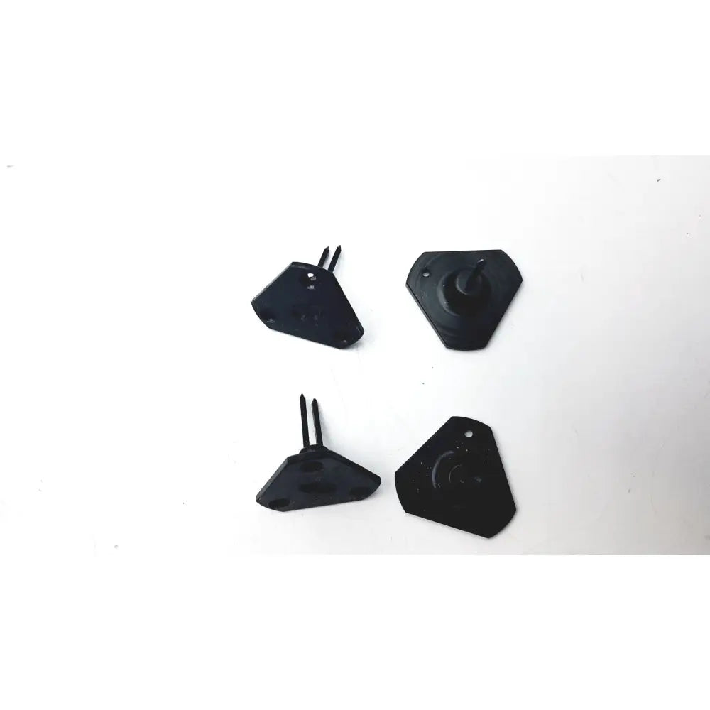 Black plastic car air vent covers with dual prongs and central hole for mounting in calibration kit a1146001b