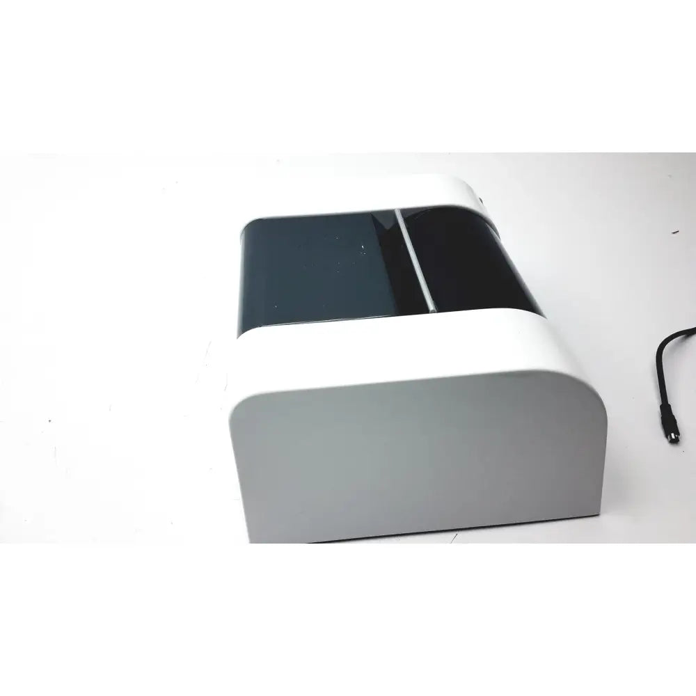 White and black dual-layered nail dryer with glossy finish featured in 3 shape calibration kit a1146001b with legato 2 scanner