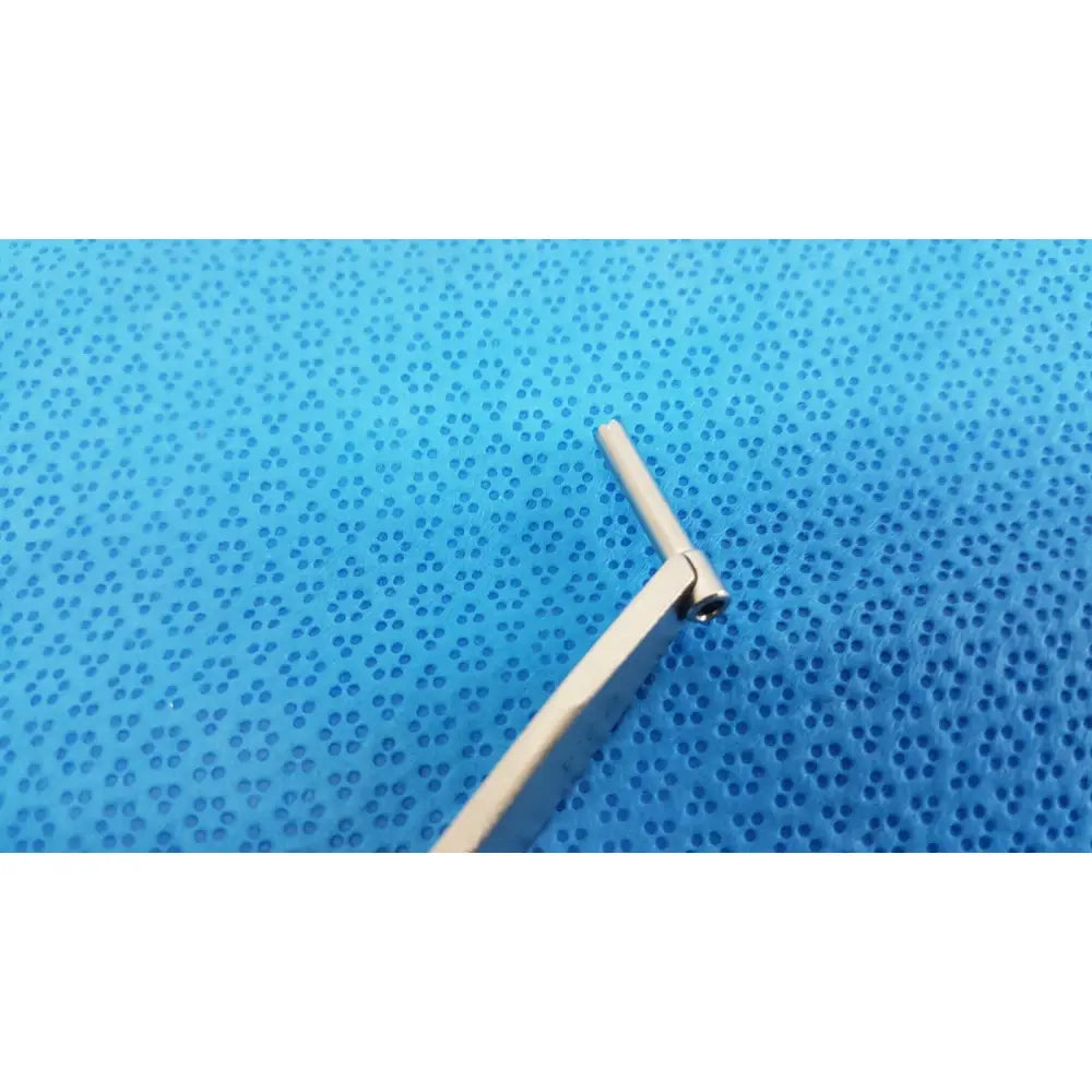 Silver-colored metal drill depth gauge with pivoting arms and angled handle for surgical orthopedic use