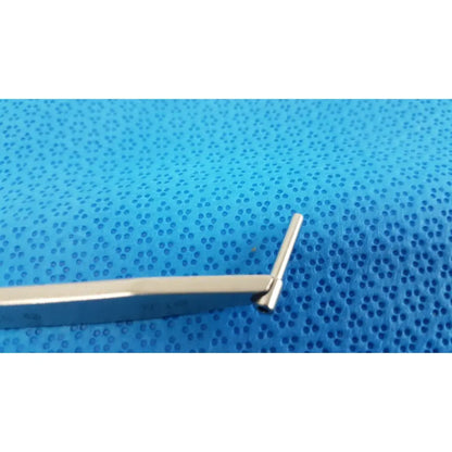 Silver-colored metal surgical orthopedic 312.18 drill depth gauge with pivoting arms and curved tip for drill depth measurement