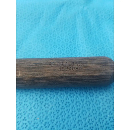 Dark brown wooden handle with engraved markings on hex screwdriver stainless surgical instrument stainless steel