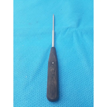 Dark wooden-handled surgical instrument with slender metallic shaft hex screwdriver stainless steel for precision use
