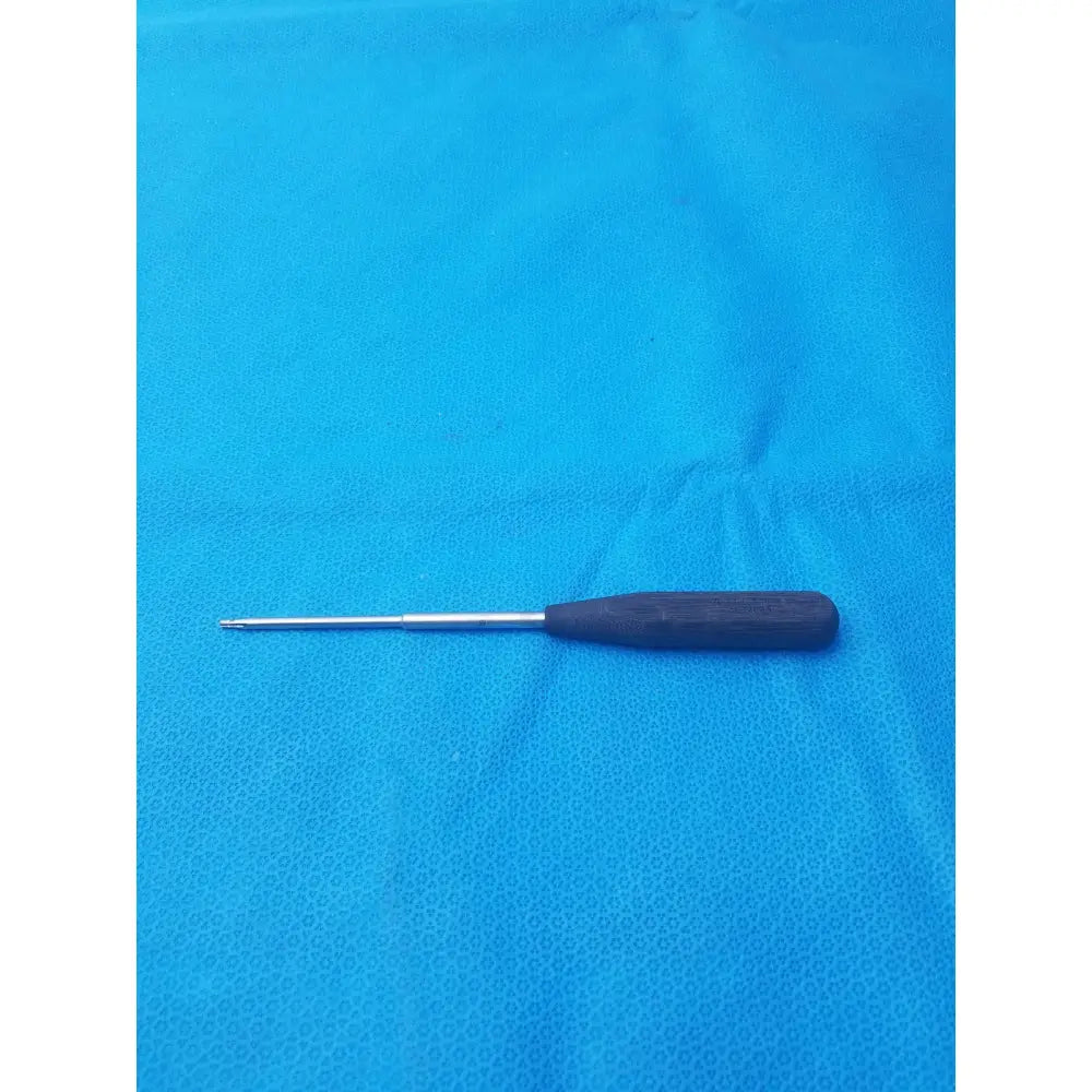 A sleek dark brown wooden-handled hex screwdriver stainless steel surgical instrument with a polished shaft