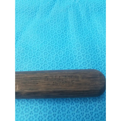 Dark brown wooden handle with engraved markings on hex screwdriver stainless steel surgical instrument model 314.115