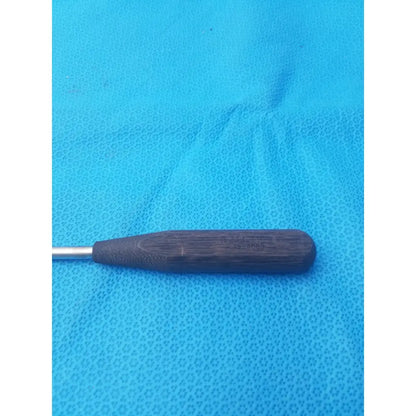 Dark wood-handled hex screwdriver stainless steel surgical instrument with metallic shaft for precise medical use