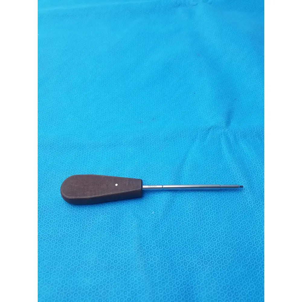 Brown wooden-handled hex screwdriver stainless with long slender stainless steel surgical shaft for precise use