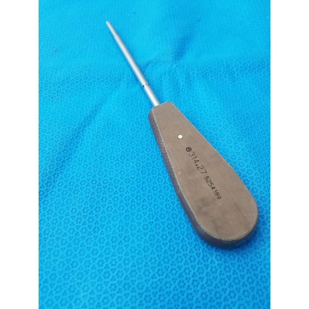 A surgical instrument hex screwdriver stainless with wooden handle and engraved markings on stainless steel shaft