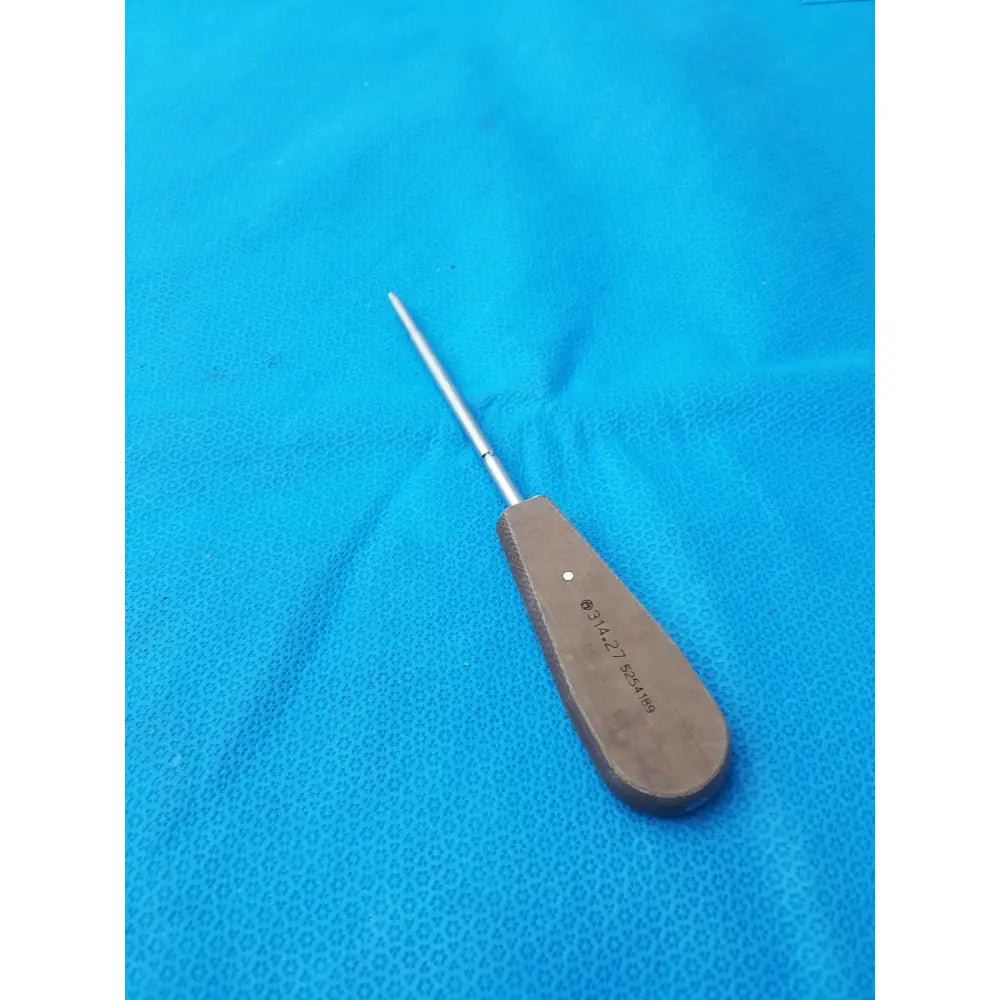 A surgical instrument hex screwdriver stainless steel with polished metallic shaft and brown wooden handle with engravings
