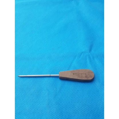Wooden-handled hex screwdriver stainless steel surgical instrument with slender metallic shaft and engraved serial number
