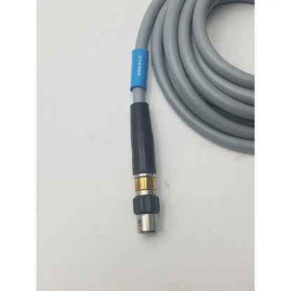Gray high-pressure washer hose with black brass nozzle and blue label marked 314890 for fiber optic light guide cable use