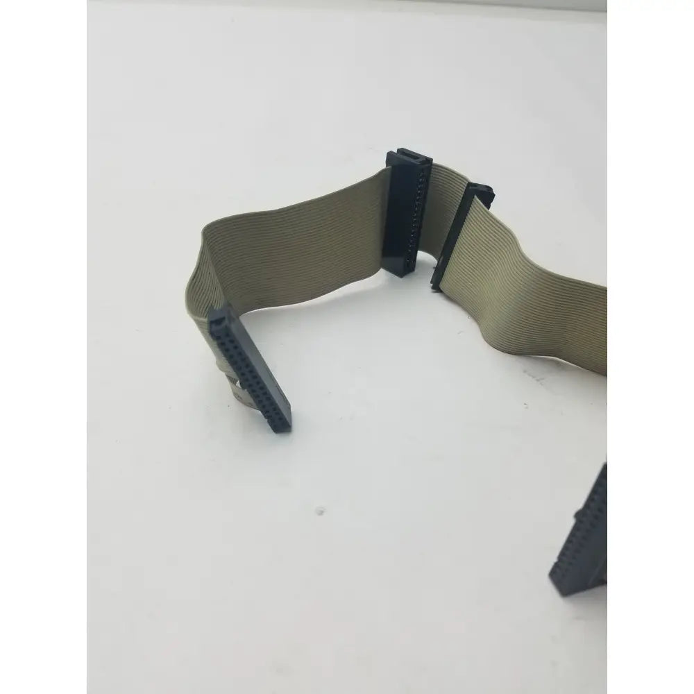 Tan flexible ribbon riser card cable with 34 pin female black plastic connectors for riser card connections
