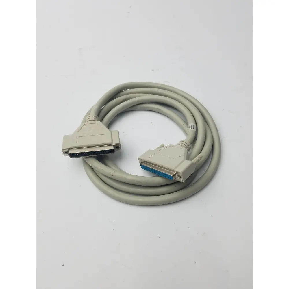 Gray coiled 36-pin Centronics to 25-pin db25 lpt cord printer cable with beige connectors and blue internal contacts