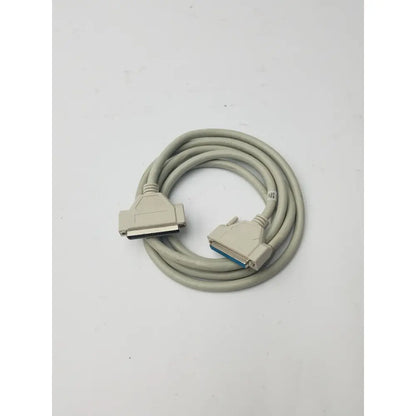 Gray coiled 36-pin centronics to 25-pin db25 lpt cord printer cable with beige connectors and blue internal contacts