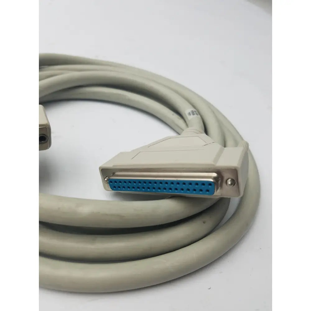 Beige coiled 36-pin centronics to 25-pin db25 lpt cord printer cable with blue connector and metallic housing for printer use