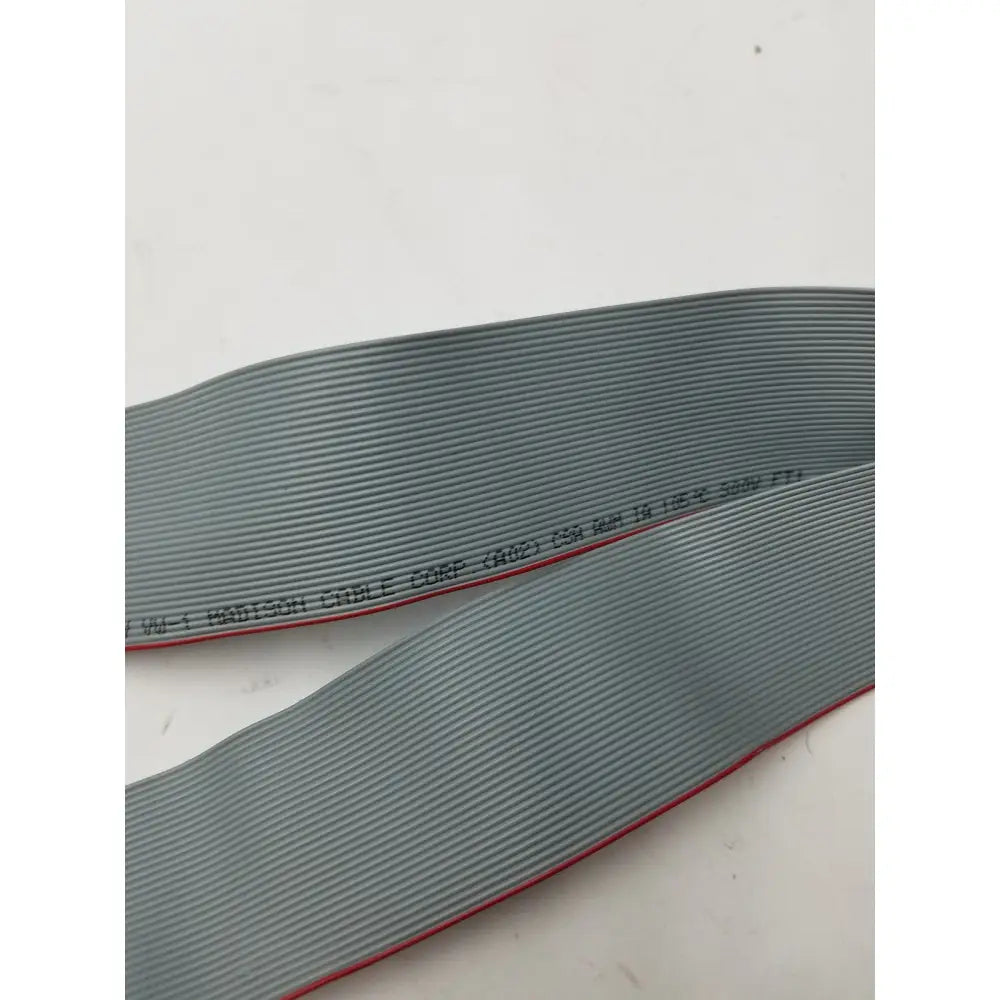 Gray 36 pin female to 36 pin female cable harness with red edge and printed text for electronic connections