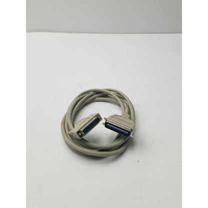 Beige coiled 36-pin male to 25-pin male parallel printer cable with metallic connectors and blue internal contacts