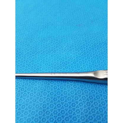 A sleek spratt bone curette stainless surgical instrument with polished stainless steel finish and ergonomic handle