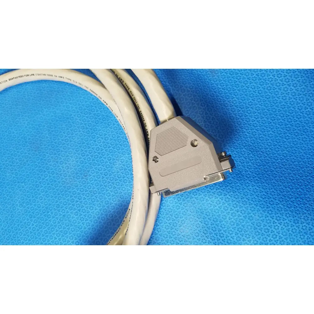 White coiled connector data cable with gray 37 male pin to 37 female pin connector featuring metallic screw terminals