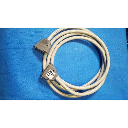 Beige coiled 37 male to 37 female pin connector data cable with gray plastic connectors and labeled 3 2/16 female pin connector