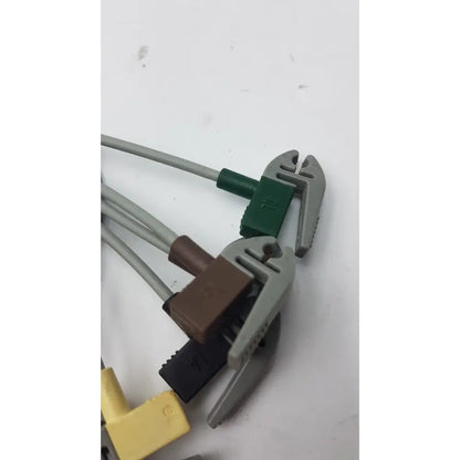 Gray plastic pipe wrenches with green brown and black connectors for compatible ecg telemetry 5 lead grabbers
