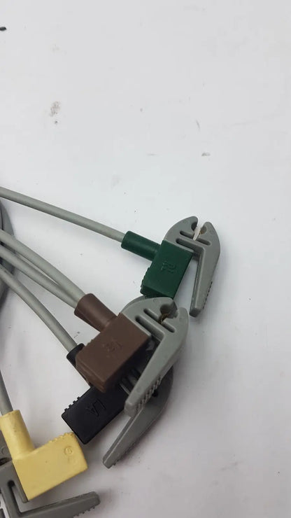Gray and green plastic-handled wire cutters with adjustable jaws for compatible ecg telemetry 5 lead grabbers 394111-011