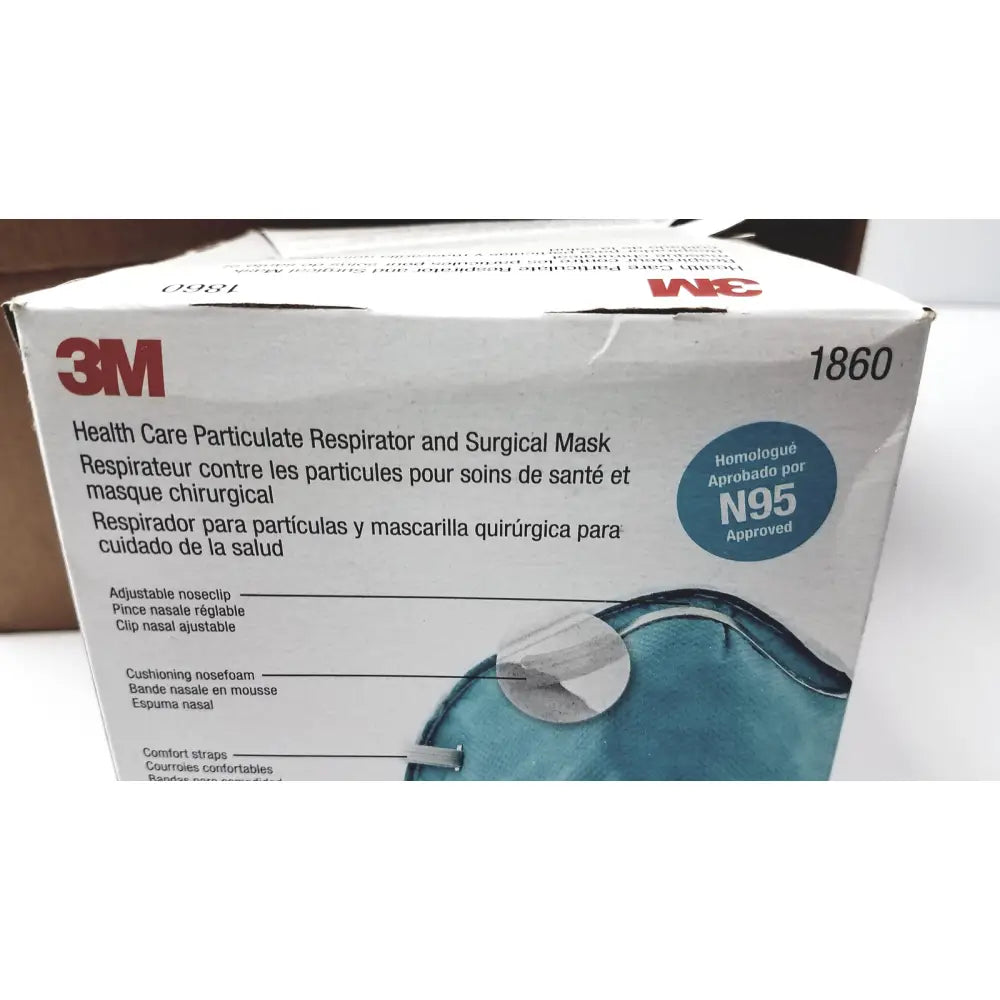 White 3M 1860 particulate respirator and surgical mask box featuring blue mask illustration with adjustable noseclip and foam