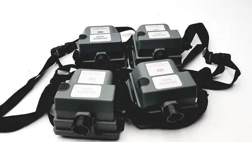 Black plastic 3m 520-03-63 air-mate hepa filter unit with white labels and adjustable filter unit battery straps