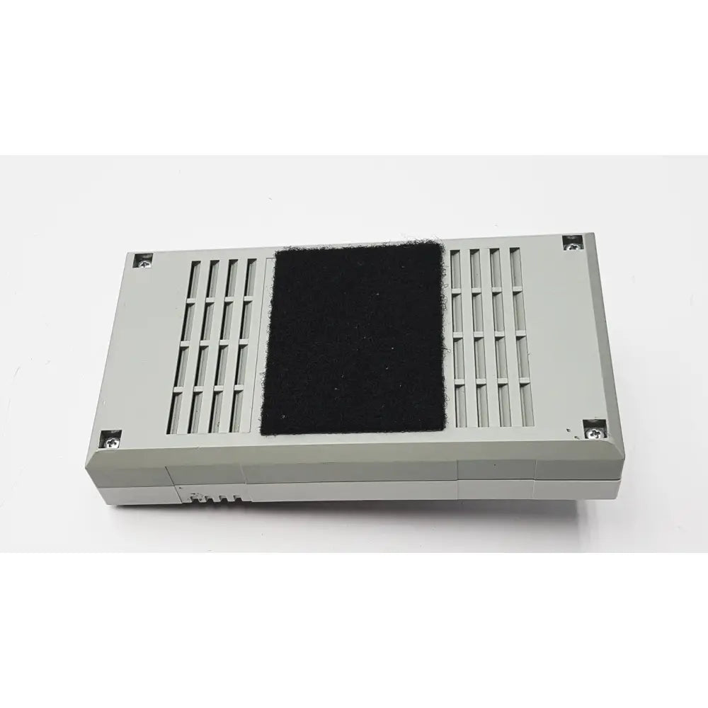 Gray rectangular 3M 60923 half mask respirator with black felt pad and vertical slotted vents for enhanced filtration