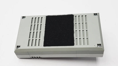 Gray rectangular 3M 60923 half mask respirator with black felt pad and vertical slotted vents for enhanced filtration