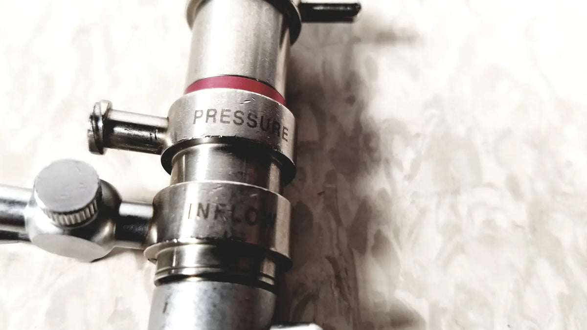 Stainless steel 3M 83272 pressure dispensing cannula with engraved pressure and inflow markings and red seal band