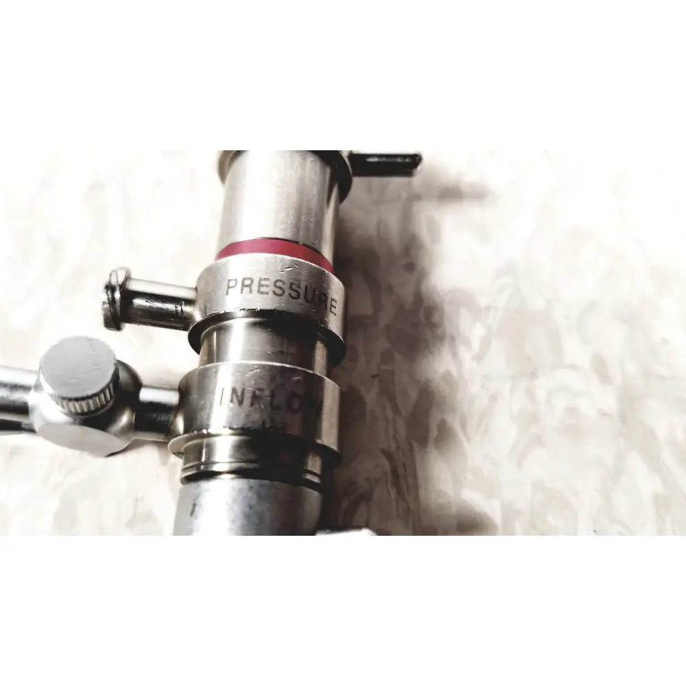 Stainless steel 3M 83272 pressure dispensing cannula with engraved pressure and inflow markings and red seal band