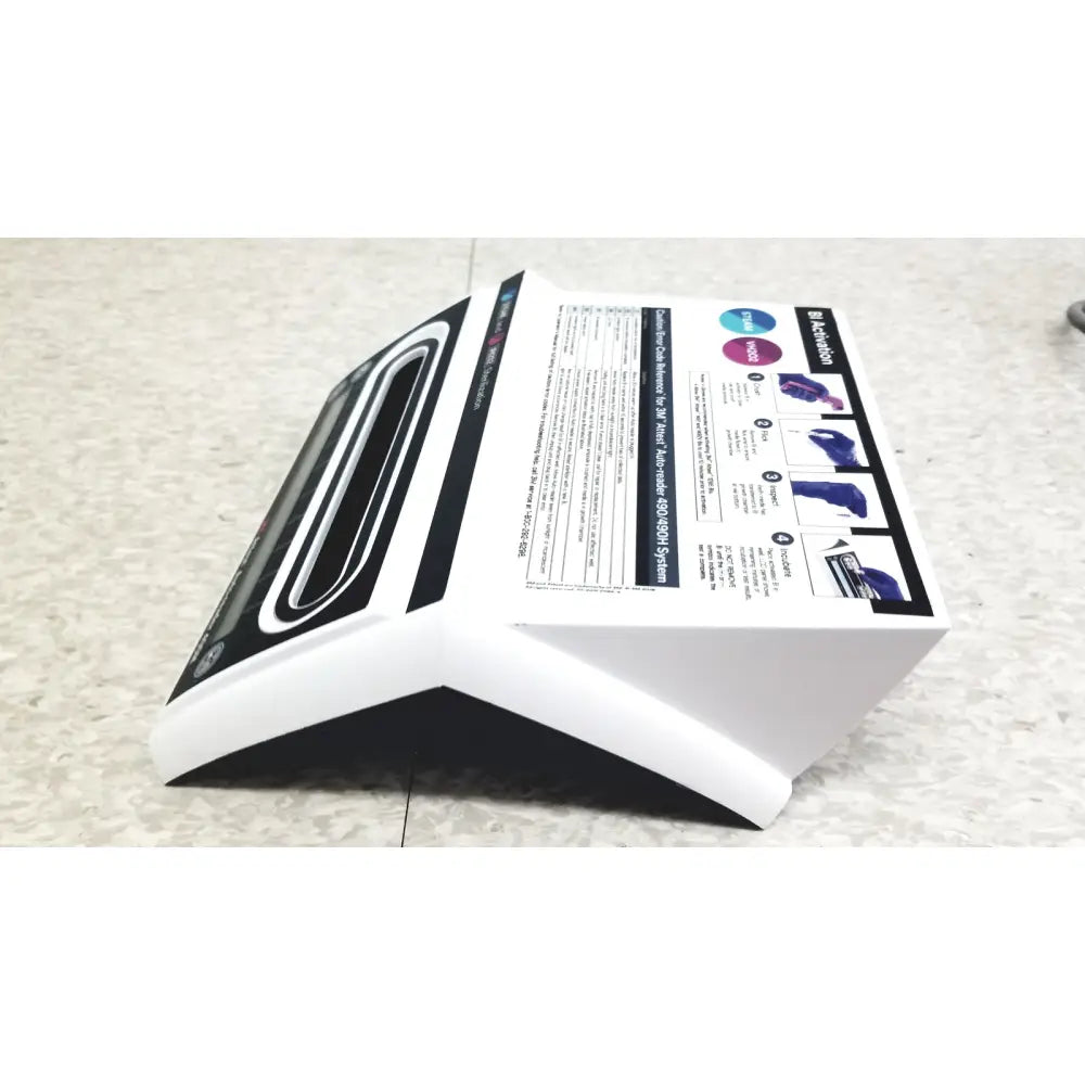 White and black plastic box for nail uv lamp system shown with 3m attest auto-reader 490h incubator reader