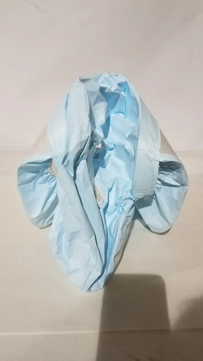 Light blue crinkled plastic raincoat with elasticated cuffs and zipper closure for 3m be-12lb blue respirator headcover
