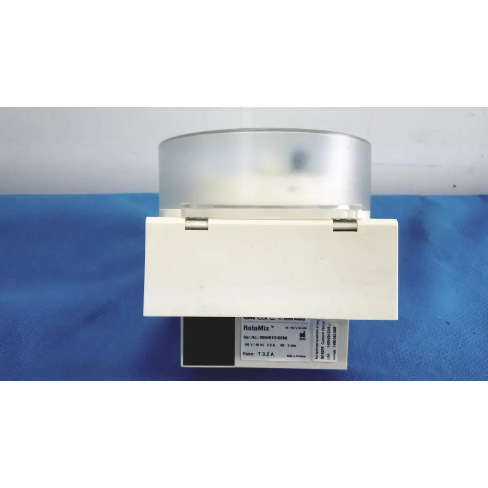 White 3M ESPE Rotomix capsule mixing unit 120v with translucent cylindrical top and metallic hinge details