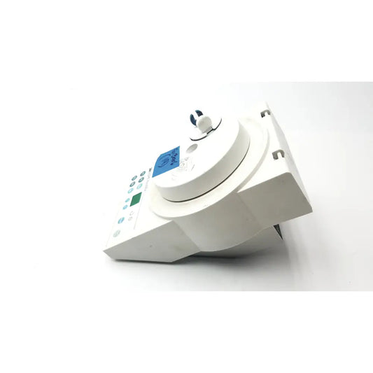 White plastic medical device 3M ESPE RotoMix with circular top blue digital display and multiple control buttons for reuse medical applications