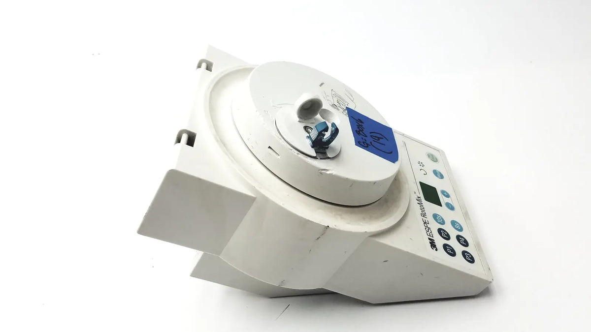 White 3m infusion pump with blue label and control panel for reuse medical applications in 3M ESPE RotoMix