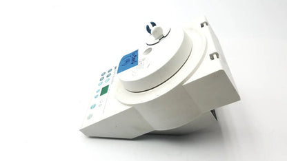 White plastic medical device 3M ESPE RotoMix with circular top blue digital display and multiple control buttons for reuse medical applications