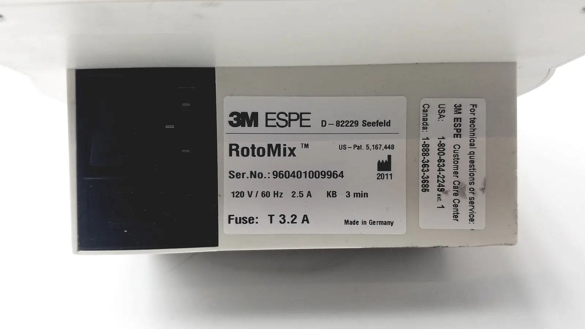 White 3m espe rotomix laboratory mixer with black label showing specifications and serial number for reuse medical applications